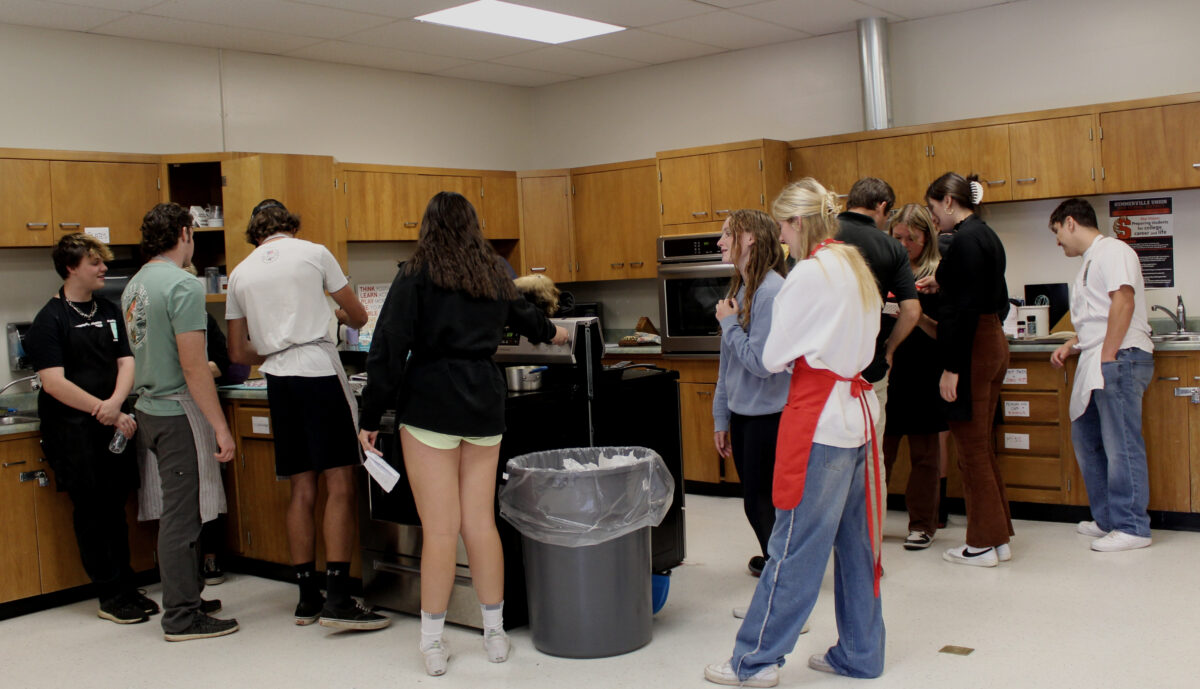 PICTURED: Mr. Atkins Senior Seminar class participates in cooking labs in order to obtain skills for the future. 