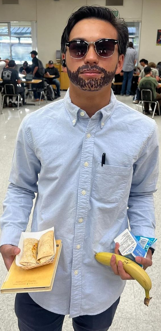 For Dress Like a Teacher Day, this junior, Jonah Fowler, decided to go all out with an impression of Mr.Bainbridge. Fowler dressed up as Mr.Bainbridge and hit it out of the park and it was amazing, said Maggie Beck.